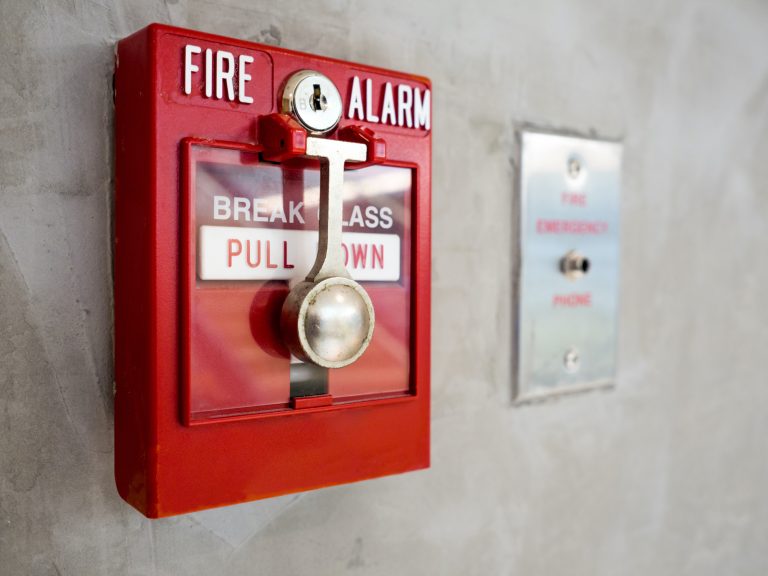 Push button switch, fire alarm on mortar wall for alarm and security system